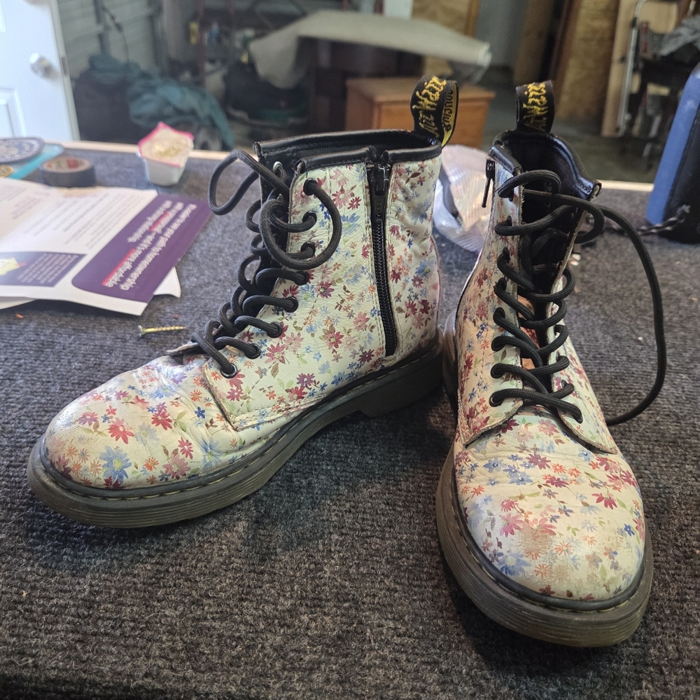 Dr. Martens Cream Ankle Boots with Distinctive Design